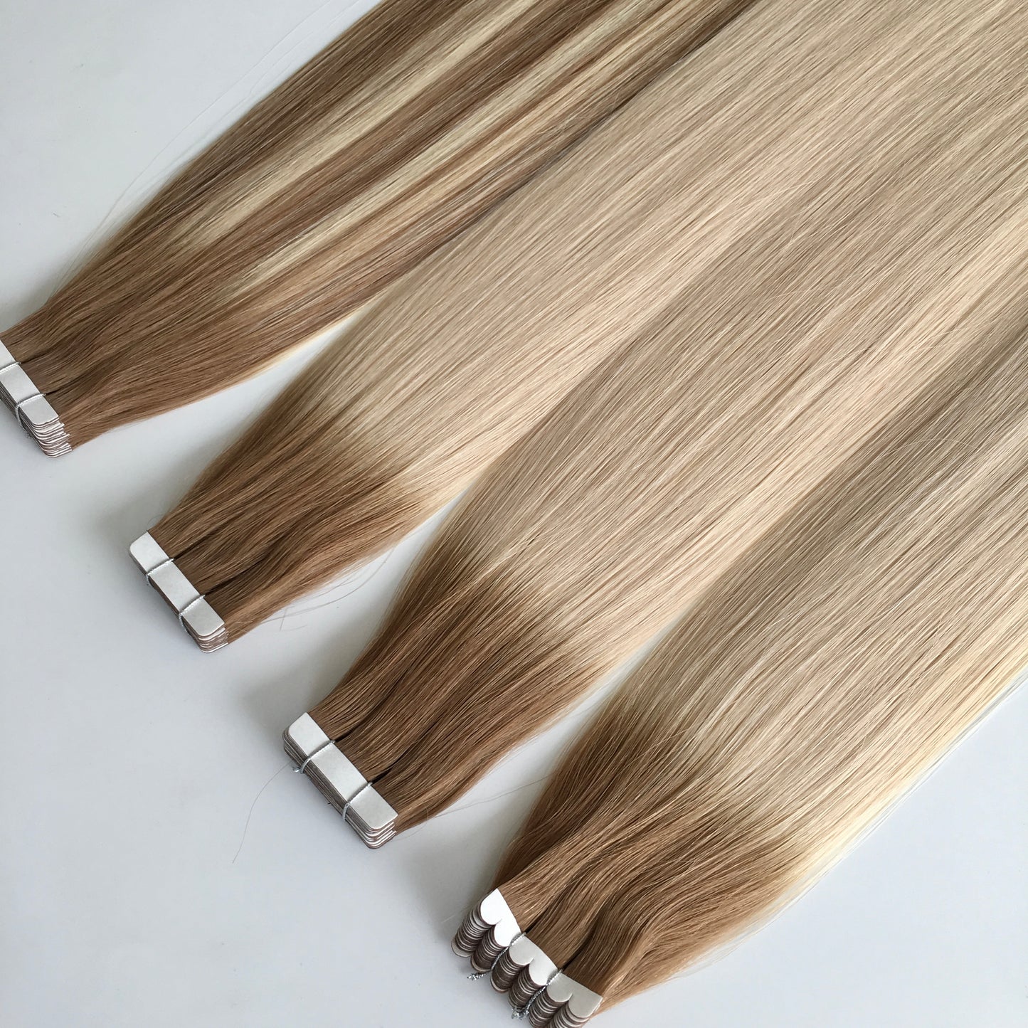 100g comes in 40 pieces Tape in Hair Russian Hair cuticle intact human hair