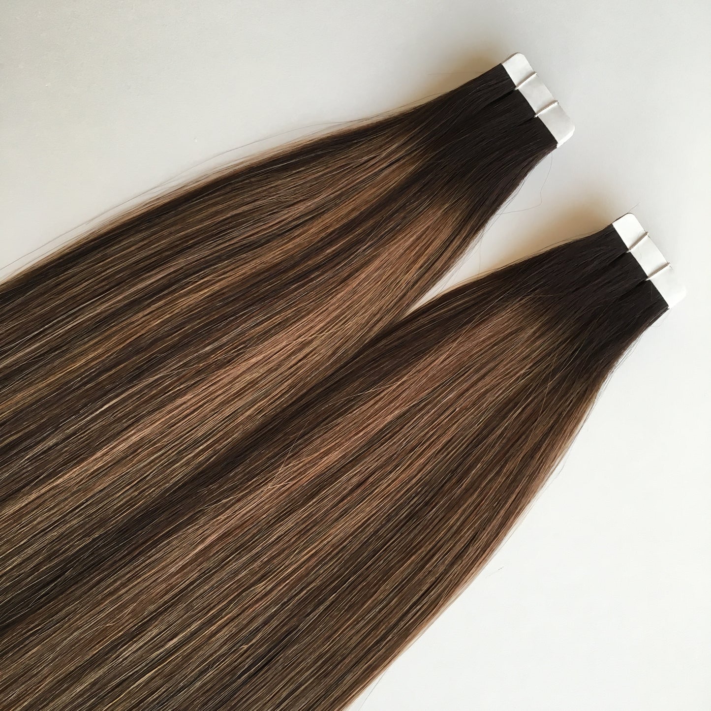 100g comes in 40 pieces Tape in Hair Russian Hair cuticle intact human hair